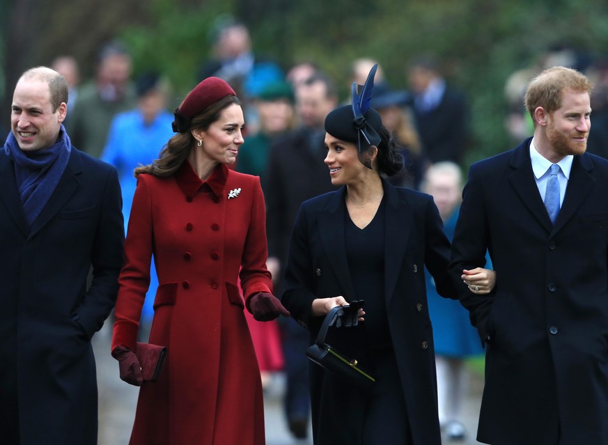 KING'S LYNN, ENGLAND - DECEMBER 25: (L-R) Prince William, Duke of Cambridge, Catherine, Duchess of Cambridge, Meghan, Duchess of Sussex and Prince Harry, Duke of Sussex arrive to attend Christmas Day  ...