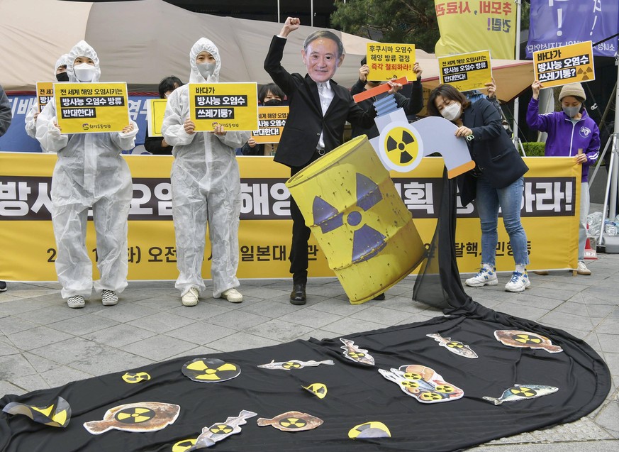 Protest in Seoul against Japan s decision to release water from Fukushima plant into sea South Korean environmental group members gather near the Japanese Embassy in Seoul on April 13, 2021, to protes ...