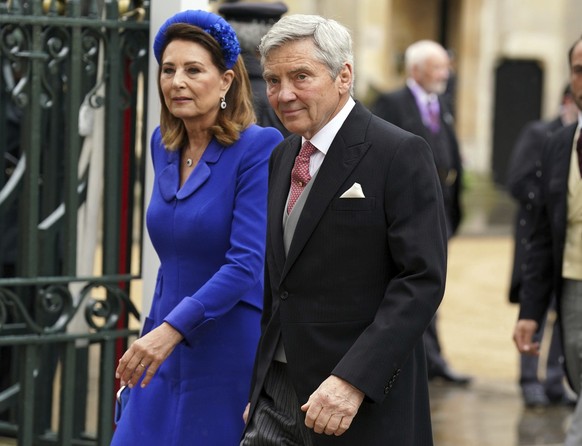 Michael and Carole Middleton arrive at Westminster Abbey ahead of the coronation of King Charles III and Camilla, the Queen Consort, in London, Saturday, May 6, 2023. (Andrew Milligan/Pool via AP)