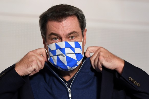 Bavarian Prime Minister Markus Soeder arrives for an influenza injection in Munich, Germany, October 6, 2020. REUTERS/Andreas Gebert