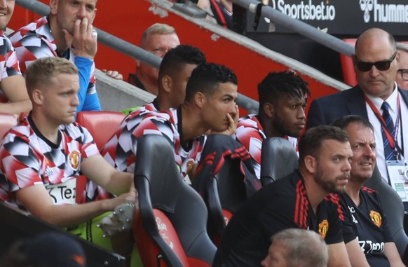 Southampton, England, 27th August 2022. Cristiano Ronaldo of Manchester United, ManU looks dejected as he sits on the subs bench during the Premier League match at St Mary s Stadium, Southampton. Pict ...