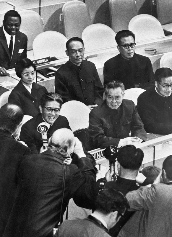 The Chinese delegation is surrounded by members of the press after a plenary meeting of the 26th session of the United Nations General Assembly in New York, Nov. 15, 1971. () Headlines: 50 years on, C ...
