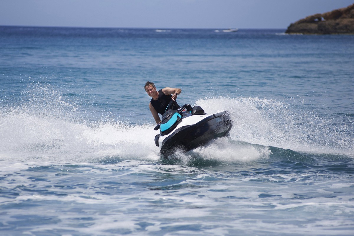 Person riding a jet ski at full speed on the sea in Mallorca, Spain. model released, Symbolfoto property released, BSCF00679