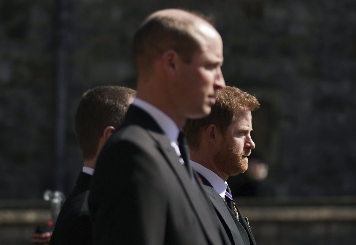 Prince William, the Duke of Cambridge and Prince Harry walk in the procession, ahead of Britain Prince Philip&#039;s funeral at Windsor Castle, Windsor, England, Saturday April 17, 2021. Prince Philip ...
