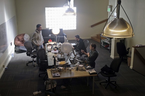 FILE - In this April 7, 2011, file photo, CEO Kevin Systrom, at left, chats with engineers Shayne Sweeney, center, and Mike Krieger at Instagram in San Francisco. In a statement late Monday, Sept. 24, ...
