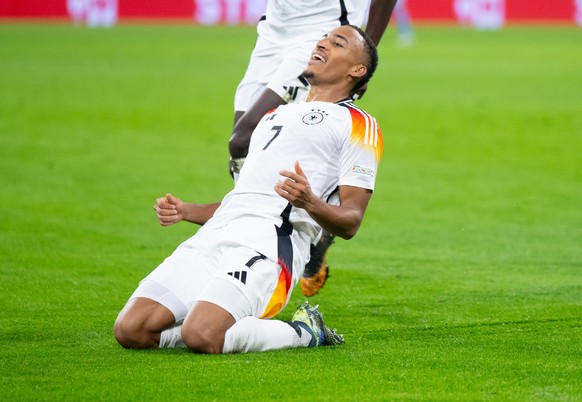 14.10.2024, Bayern, M�nchen: Fu�ball, Nations League A, Deutschland - Niederlande, Gruppenphase, Gruppe 3, Spieltag 4, Allianz Arena, Deutschlands Jamie Leweling jubelt �ber das Tor zum 1:0. (zu dpa:  ...