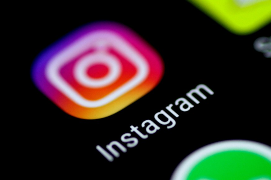 FILE PHOTO: The Instagram application is seen on a phone screen August 3, 2017. REUTERS/Thomas White/File Photo