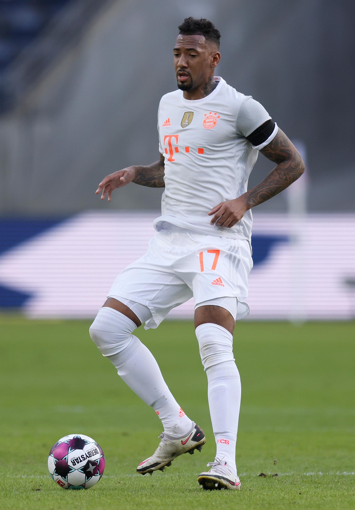 FRANKFURT AM MAIN, GERMANY - FEBRUARY 20: Jerome Boateng of FC Bayern Muenchen runs with the ball during the Bundesliga match between Eintracht Frankfurt and FC Bayern Muenchen at Deutsche Bank Park o ...