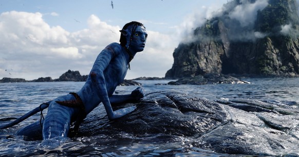 This image released by 20th Century Studios shows Britain Dalton, as Lo'ak, in a scene from &quot;Avatar: The Way of Water.&quot; (20th Century Studios via AP)