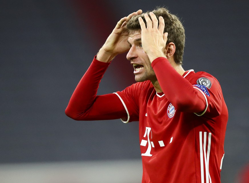 Bayern Munich's Thomas Müller reacts during the Champions League Group A soccer match between Bayern Munich and Atletico Madrid at the Allianz Arena in Munich, Germany, Wednesday, Oct. 21, 2020. (AP P ...