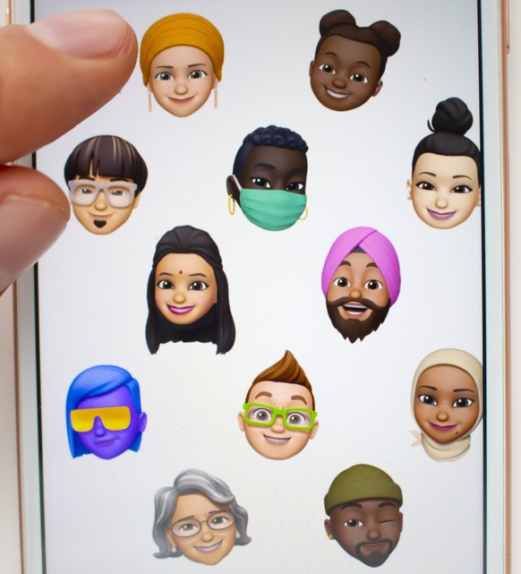 San Francisco, California, USA. A person using the new New Memoji styles and stickers from IOS14 San Francisco, California, USA. A person using the new New Memoji styles and stickers from IOS14 Copyri ...