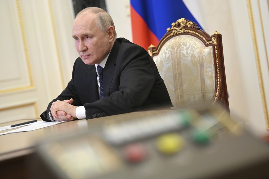 Russian President Vladimir Putin Vladimir attends a meeting on the situation in the area of the Crimean bridge via video conference at the Kremlin in Moscow, Russia, Monday, July 17, 2023. (Alexander  ...