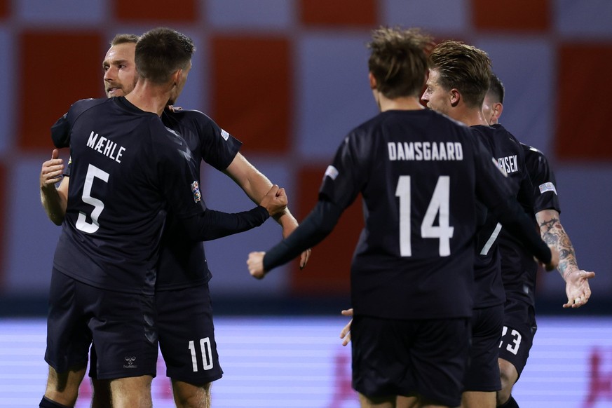 PXL_Croatia v Denmark: UEFA Nations League - League Path Group 1 ZAGREB, CROATIA - SEPTEMBER 22: Christian Eriksen of Denmark celebrates with teammates after scoring their first goal during the UEFA N ...