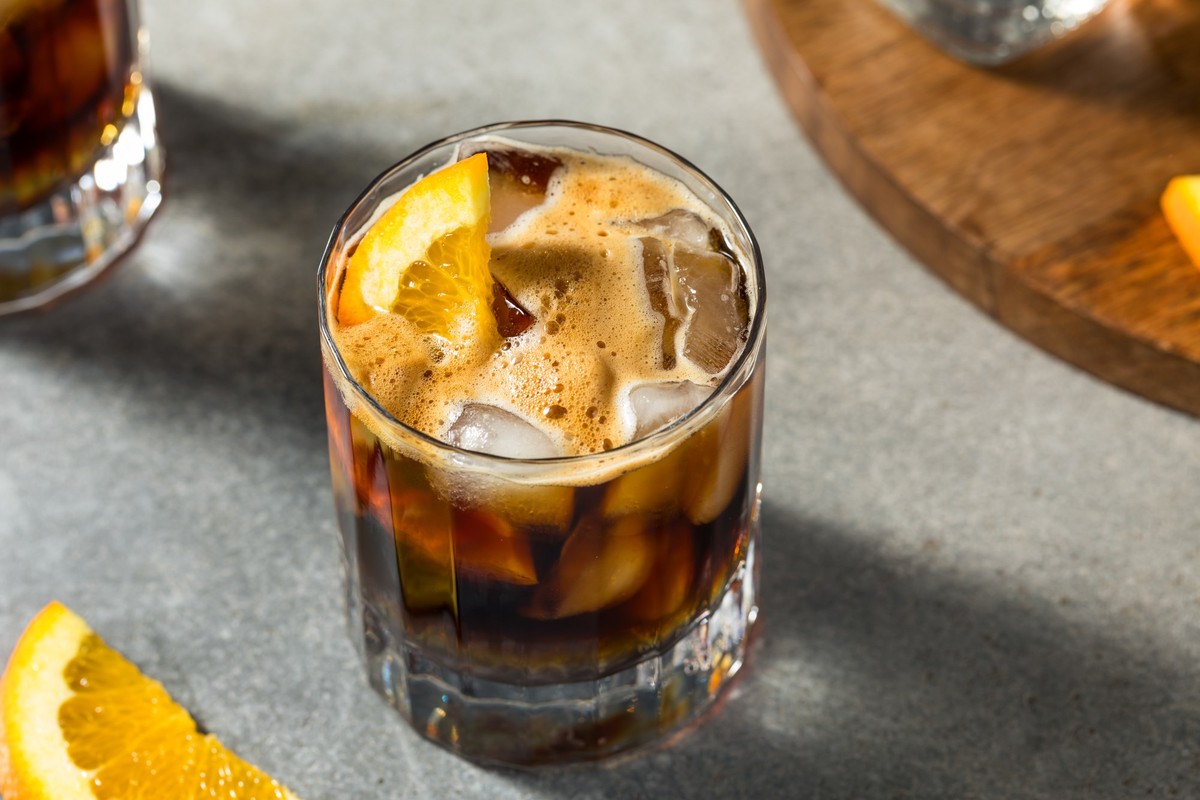 Refreshing Boozy Espresso Tonic Drink with an Orange Garnish xkwx americano aroma background bar beverage brown bubble cafe caffeine cocktail coffee cold cool delicious drink espresso espresso cocktai ...