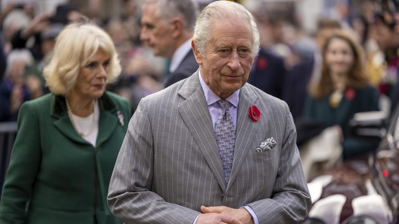 FILE - Britain's King Charles III and Camilla, Queen Consort, walkabout to meet members of the public following a ceremony at Micklegate Bar, in York, England, Wednesday Nov. 9, 2022. King Charle ...