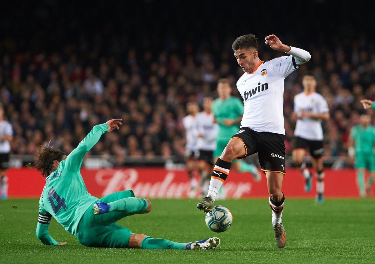 December 15, 2019, Valencia, Valencia, Spain: Ferran Torres of Valencia and Sergio Ramos of Real Madrid during the La Liga Santander match between Valencia and Real Madrid at Estadio de Mestalla on De ...