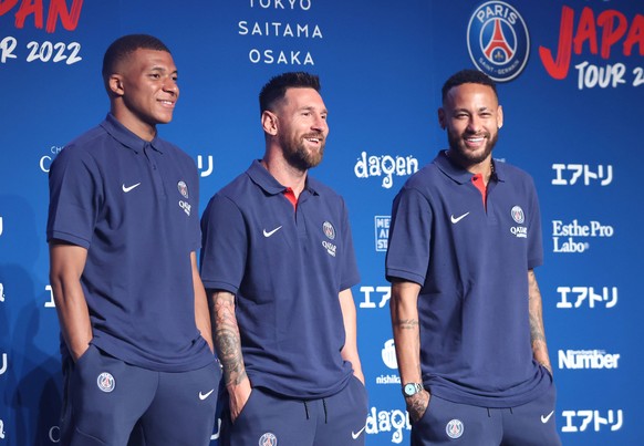 July 17, 2022, Tokyo, Japan - L-R French football club team Paris Saint-Germain star players Kylian Mbappe, Lionel Messi and Neymar Jr pose for photo at a press conference, PK, Pressekonferenz upon th ...