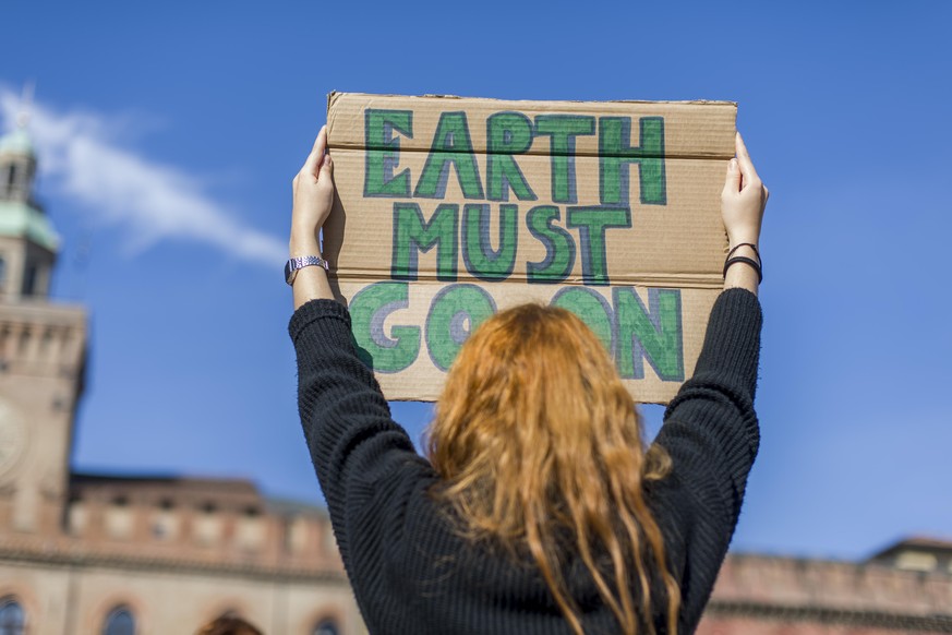 BOLOGNA, ITALY - OCTOBER 09: Hundreds of students in Piazza Maggiore call for concrete action against climate change during a demonstration as part of the global climate strike throughout Italy promot ...