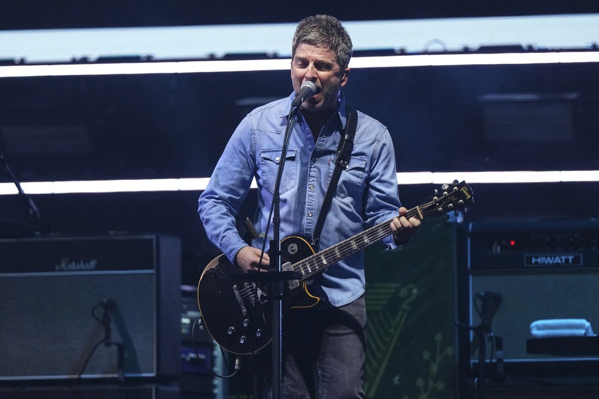 Noel Gallagher from the band Oasis performs during their reunion concert on Friday, July 4, 2025, in Cardiff. (Photo by Scott A Garfitt/Invision/AP)