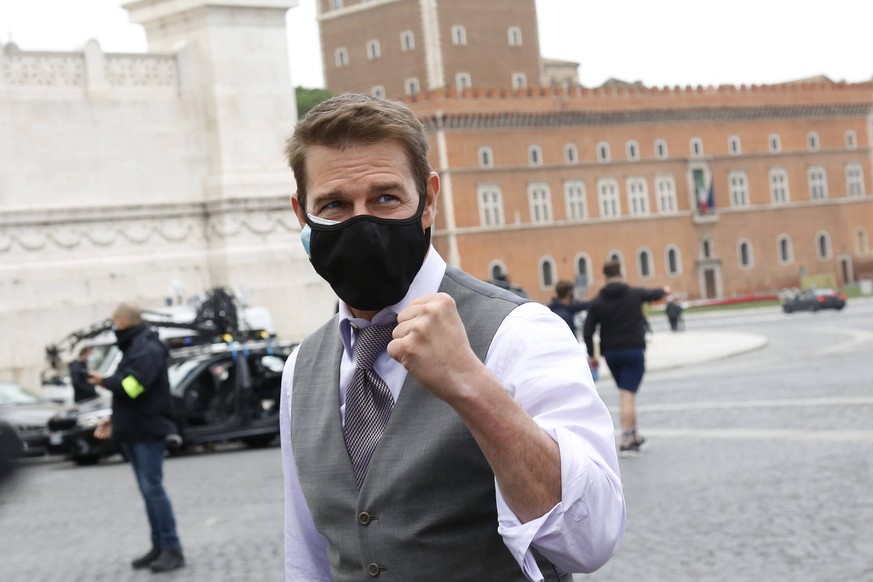 Actor Tom Cruise talking and making selfie with his fans during a pause on the set of the film Mission Impossible 7 in Piazza Venezia, just in front of the Victor Emmanuel II Monument Tomb of the Unkn ...