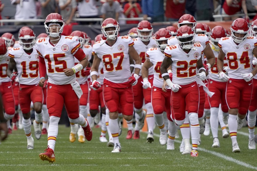 Kansas City Chiefs quarterback Patrick Mahomes (15) leads his team onto the field before an NFL preseason football game against the Chicago Bears Saturday, Aug. 13, 2022, in Chicago. (AP Photo/David B ...