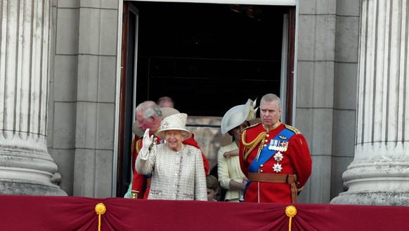 Trooping the Colour Queen Elizabeth ll stands on the balcony of Buckingham Palace with Prince Charles, Prince of Wales, Catherine, Duchess of Cambridge and Prince Andrew, Duke of York following Troopi ...