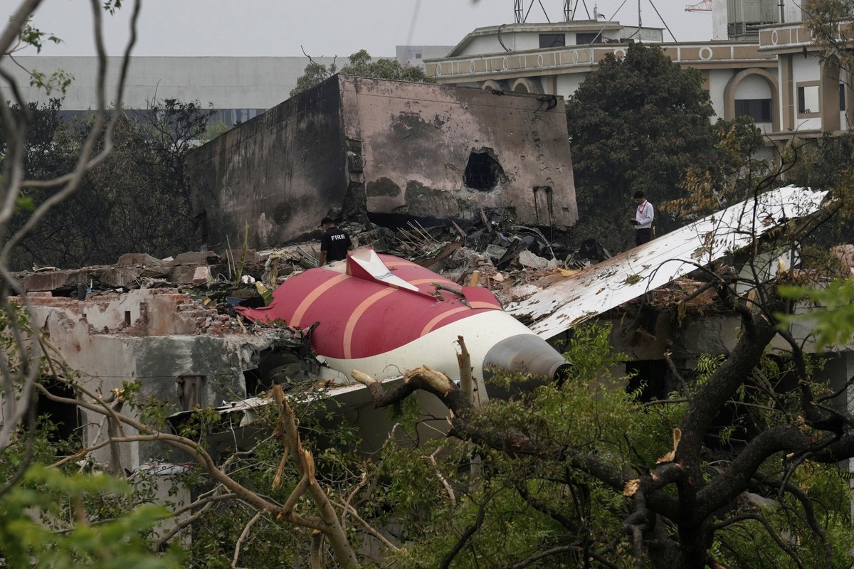 Parts of an Air India plane that crashed on Thursday are seen on top of a building in Ahmedabad, India, Friday, June 13, 2025. (AP Photo/Rafiq Maqbool)