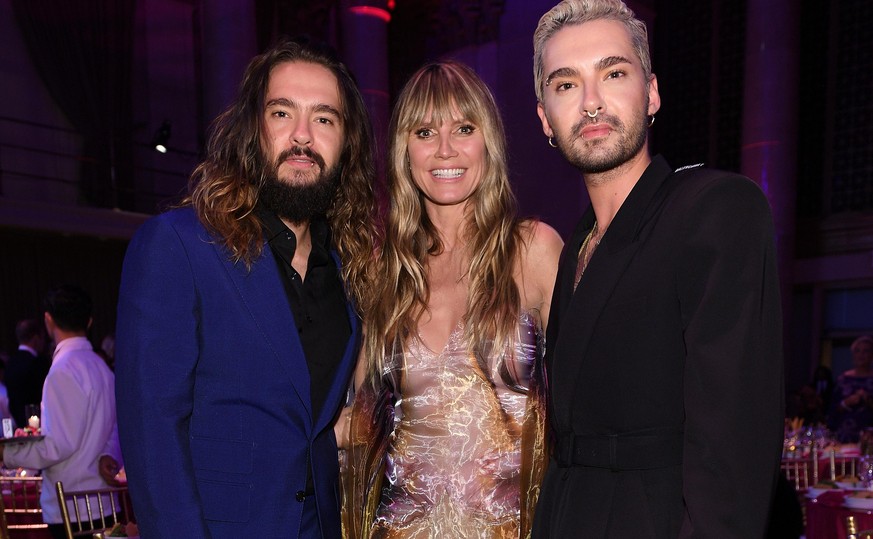 NEW YORK, NEW YORK - OCTOBER 28: (L-R) Tom Kaulitz, Heidi Klum and Bill Kaulitz attend the Angel Ball 2019 hosted by Gabrielle&#039;s Angel Foundation at Cipriani Wall Street on October 28, 2019 in Ne ...
