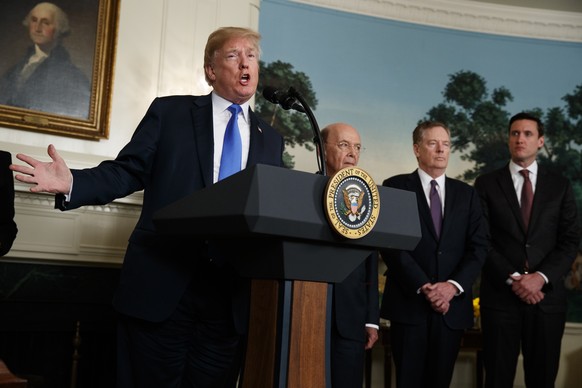 President Donald Trump speaks before he signs a presidential memorandum imposing tariffs and investment restrictions on China in the Diplomatic Reception Room of the White House, Thursday, March 22, 2 ...