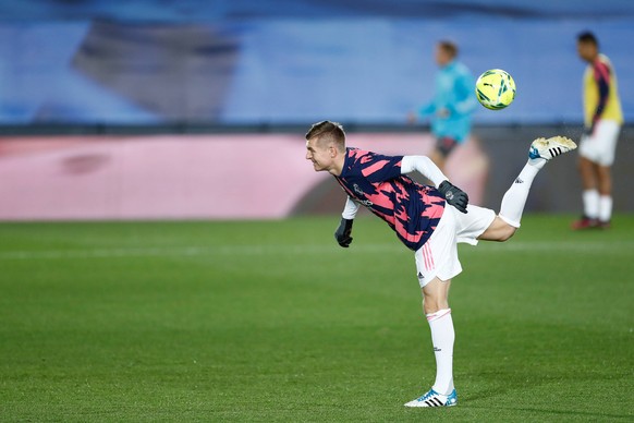 December 12, 2020, Valdebebas, MADRID, SPAIN: Toni Kroos of Real Madrid warms up during the spanish league, La Liga Santander, football match played between Real Madrid and Atletico de Madrid at Ciuda ...