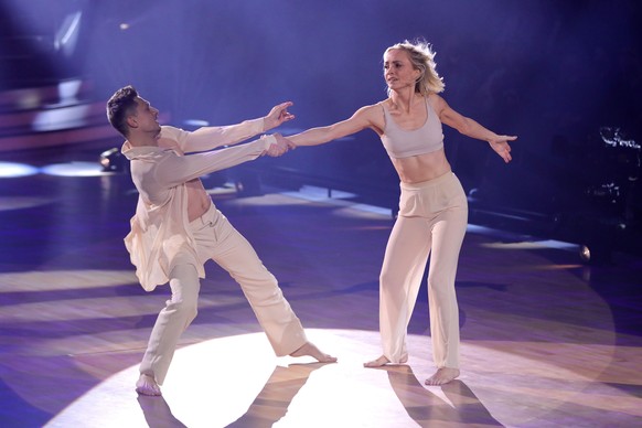 COLOGNE, GERMANY - MARCH 11: Janin Ullmann and Zsolt Sandor Cseke perform on stage during the 3rd show of the 15th season of the television competition show &quot;Let&#039;s Dance&quot; at MMC Studios ...