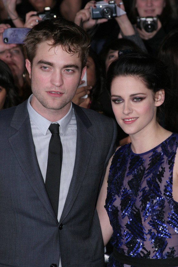 Robert Pattinson and Kristen Stewart at the world premiere of Summit Entertainment s The Twilight Saga: Breaking Dawn - Part 1 . Arrivals held at the Nokia Theatre at L.A. Live in Los Angeles, CA, Nov ...