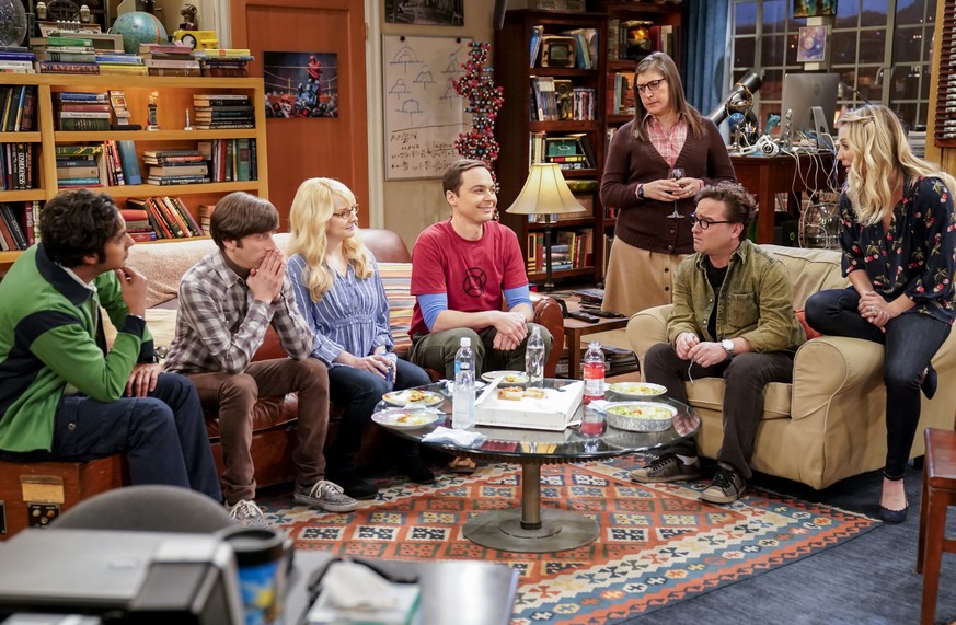 This image released by CBS shows Kunal Nayyar, from left, Simon Helberg, Melissa Rauch, Jim Parsons, Mayim Bialik, Johnny Galecki and Kaley Cuoco appear in a scene from the long-running comedy series  ...