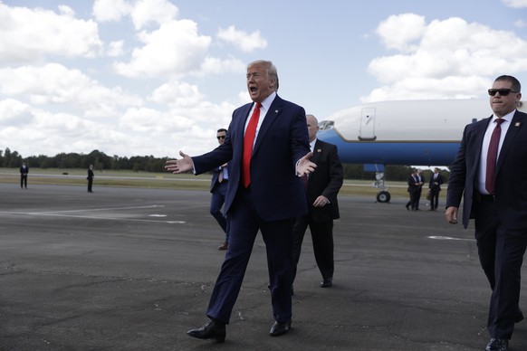President Donald Trump arrives at Ocala International Airport, Thursday, Oct. 3, 2019, in Ocala, Fla. (AP Photo/Evan Vucci)