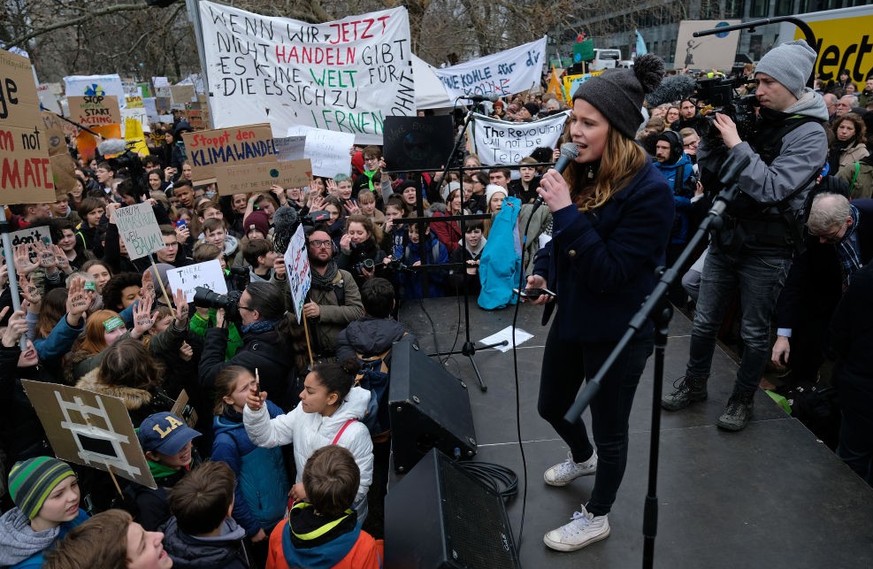 BERLIN, GERMANY - MARCH 15: Climate activist Luisa Neubauer speaks at a FridaysForFuture climate protest march on March 15, 2019 in Berlin, Germany. According to organizers striking students took to t ...