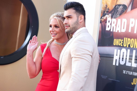 FILE - Britney Spears Is Engaged to Sam Asghari After Nearly 5 Years Together FILE - Britney Spears Is Engaged to Sam Asghari After Nearly 5 Years Together. Singer Britney Spears wearing a Nookie dres ...
