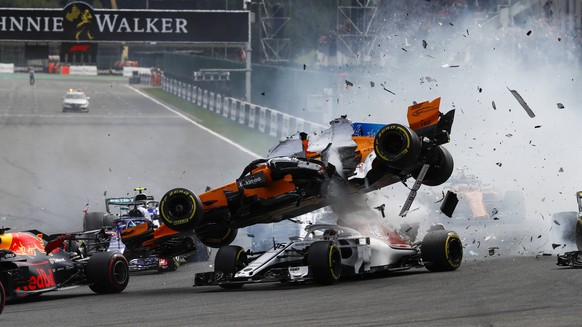 2018 Belgian GP SPA-FRANCORCHAMPS, BELGIUM - AUGUST 26: Fernando Alonso, McLaren MCL33, crashes over Charles Leclerc, Alfa Romeo Sauber C37, after contact from Nico Hulkenberg, Renault F1 Team R.S. 18 ...