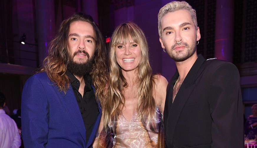 NEW YORK, NEW YORK - OCTOBER 28: (L-R) Tom Kaulitz, Heidi Klum and Bill Kaulitz attend the Angel Ball 2019 hosted by Gabrielle&#039;s Angel Foundation at Cipriani Wall Street on October 28, 2019 in Ne ...