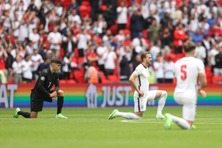 LONDON, ENGLAND - JUNE 29: Harry Kane of England and Kai Havertz of Germany take a knee in support of the Black Lives Matter movement prior to the UEFA Euro 2020 Championship Round of 16 match between ...