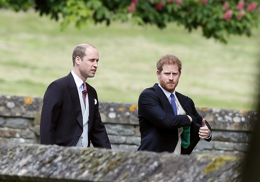 ENGLEFIELD, ENGLAND - MAY 20: Britain's Prince William, left, and his brother Prince Harry arrive for the wedding of Pippa Middleton and James Matthews at St Mark's Church on May 20, 2017 in Englefiel ...