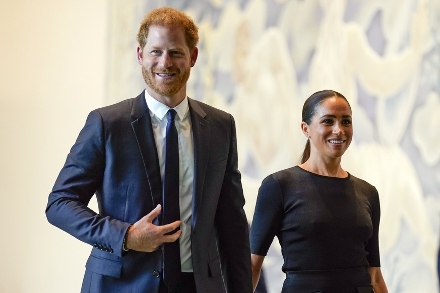 FILE - Prince Harry and Meghan Markle arrive at United Nations headquarters, Monday, July 18, 2022. A spokesperson for Prince Harry and his wife Meghan says the couple were involved in a car chase whi ...