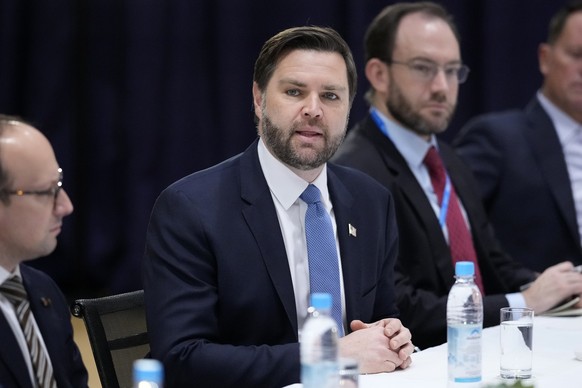 United States Vice-President JD Vance, second left, speaks during a meeting with Germany&#039;s President Frank-Walter Steinmeier and Germany&#039;s Foreign Minister Annalena Baerbock on the sidelines ...