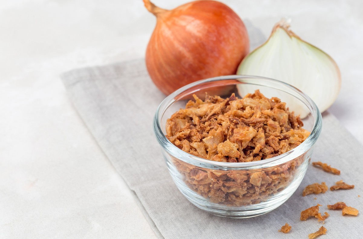 Fried onion in the glass, topping for hot dog, fast food, horizontal, copy space