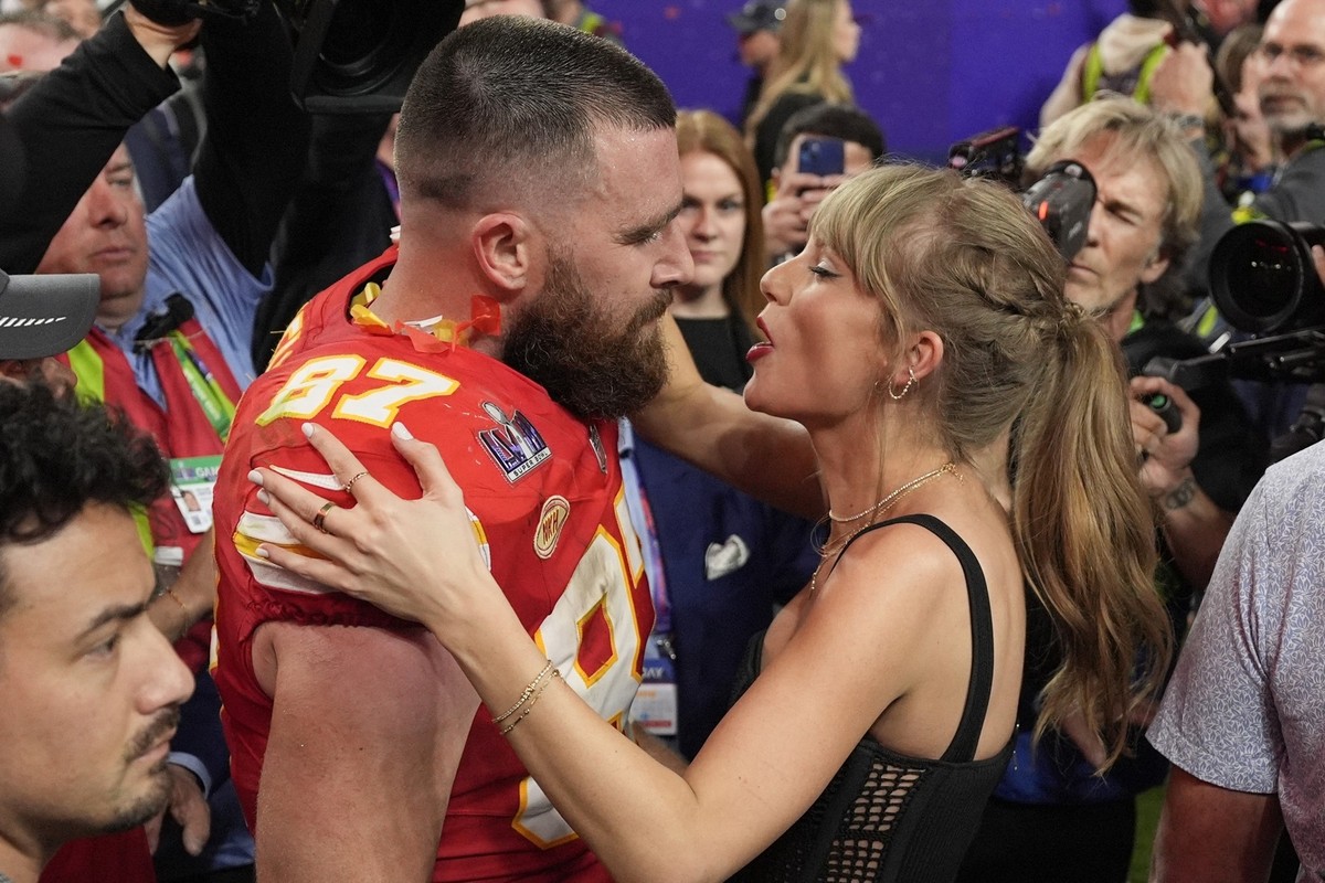 FILE = Kansas City Chiefs tight end Travis Kelce (87) speaks to Taylor Swift after the team&#039;s NFL Super Bowl 58 football game against the San Francisco 49ers, Feb. 11, 2024, in Las Vegas. A 170-y ...