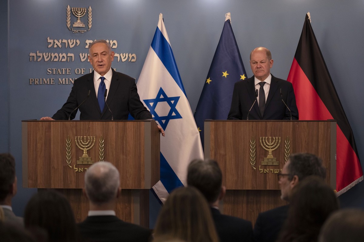 Israeli Prime Minister Benjamin Netanyahu, left, delivers his speech after a meeting with German Chancellor Olaf Scholz in Jerusalem, Sunday, March 17, 2024. (AP Photo/Leo Correa, Pool)