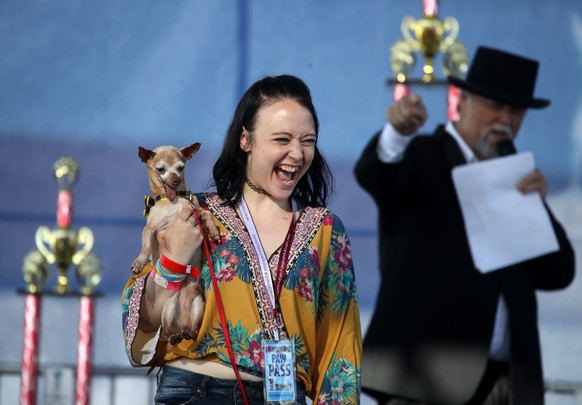 PETALUMA, CALIFORNIA - JUNE 21: Molly Horgan holds her dog Tostito during the start of the World&#039;s Ugliest Dog contest at the Marin-Sonoma County Fair on June 21, 2019 in Petaluma, California. A  ...