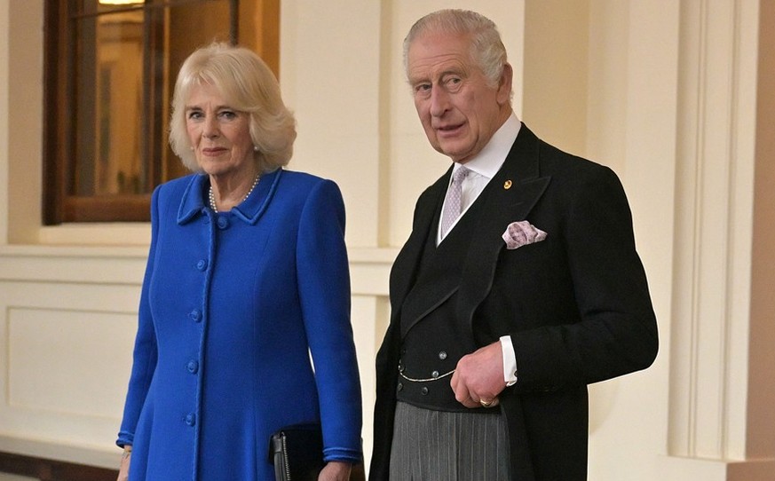 LONDON, ENGLAND - NOVEMBER 23: King Charles III and Queen Camilla look towards the media during a formal farewell to South Korea&#039;s President Yoon Suk Yeol and South Korea&#039;s First Lady Kim Ke ...
