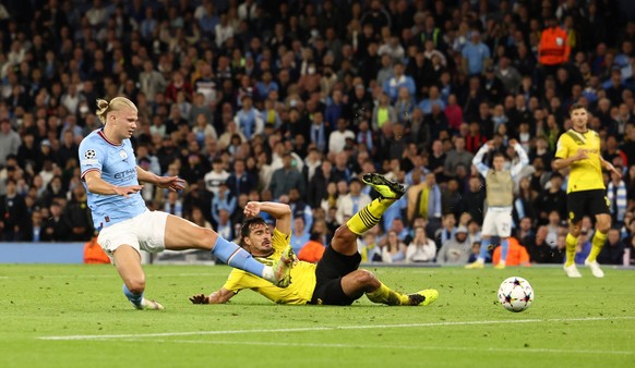 Manchester, England, 14th September 2022. Mats Hummels of Borussia Dortmund intercepts a certain goal for Erling Haaland of Manchester City during the UEFA Champions League match at the Etihad Stadium ...