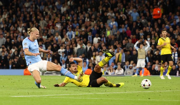 Manchester, England, 14th September 2022. Mats Hummels of Borussia Dortmund intercepts a certain goal for Erling Haaland of Manchester City during the UEFA Champions League match at the Etihad Stadium ...