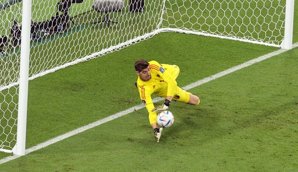 Belgium v Canada : FIFA World Cup, WM, Weltmeisterschaft, Fussball 23 November 2022, Doha, Qatar - FIFA World Cup - Group F - Belgium v Canada - Belgium goalkeeper Thibaut Courtois saves a penalty fro ...